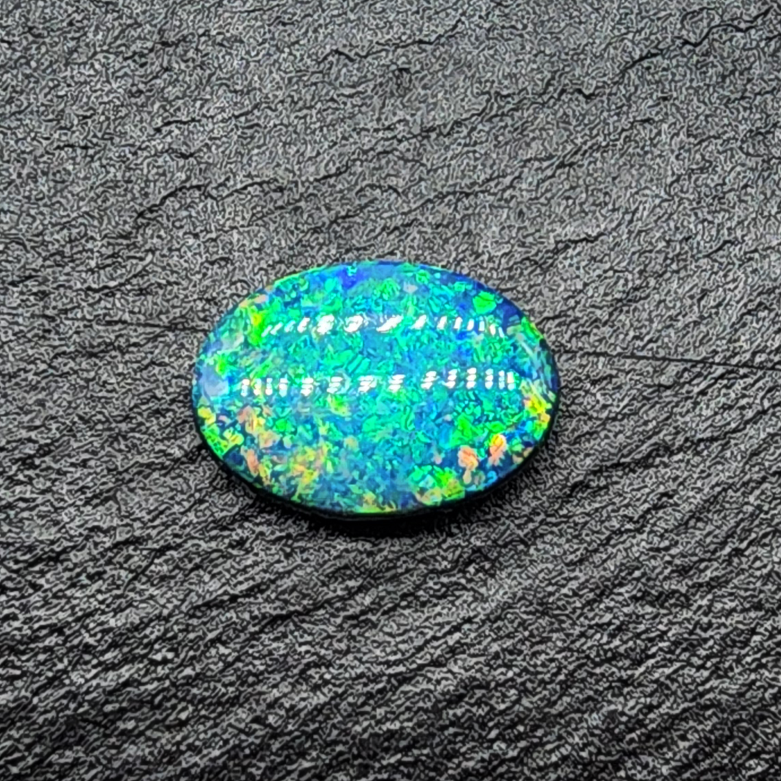 world class Black opal with exceptional green-multi color floral pattern