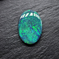 Large Museum grade black opal with a mossy, green-blue pinfire pattern