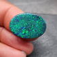 Large Museum grade black opal with a mossy, green-blue pinfire pattern