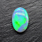 6.6cts Top gem black opal with vivid green-blue broad flash