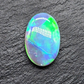 6.6cts Top gem black opal with vivid green-blue broad flash