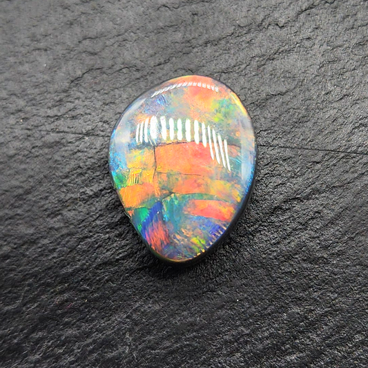 Top gem black opal with vivid red-multi color flagstone pattern