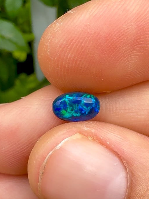 1.22ct Black Opal With A Dark Blue, Green Play Of Color, From Lightning Ridge Australia