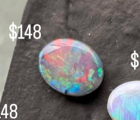 Black Opal With A Red, Pink Multicolor Play Of Color, From Lightning Ridge Australia