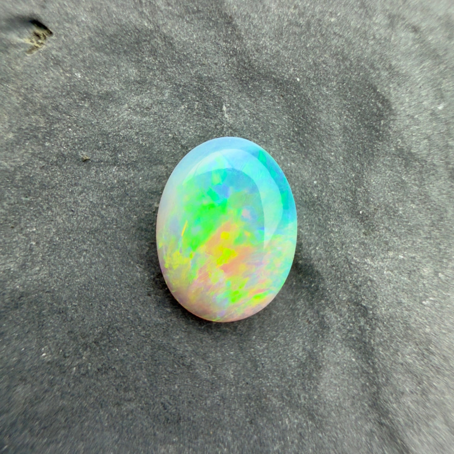 0.61cts Affordable Crystal Opal With A Blue Green Gold Play Of Color, From Lightning Ridge Australia