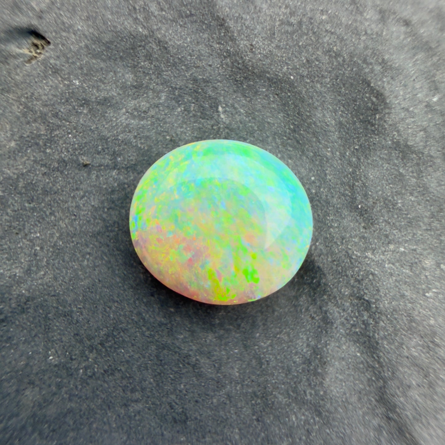 0.8cts Affordable Crystal Opal With A Blue Green Yellow Gold Play Of Color, From Lightning Ridge Australia