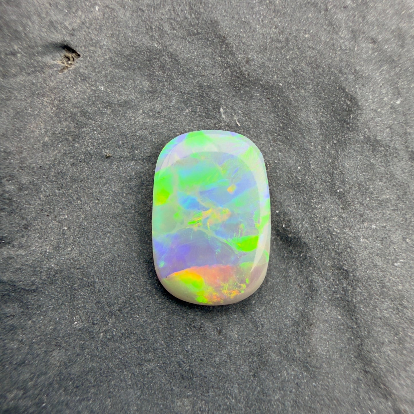 0.6cts Affordable Dark Opal With A Green Yellow Gold Play Of Color, From Lightning Ridge Australia