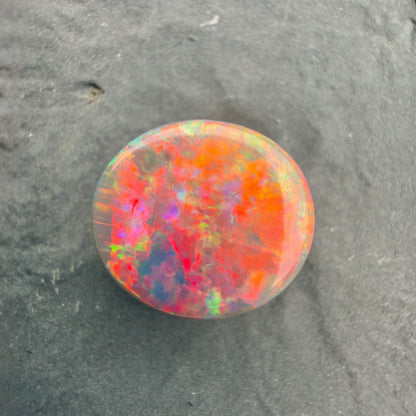 3.5ct Black Opal With A Rare Pink-Orange Broadflash Pattern, Shifting to Green As The Stone Is Moved (Copy)