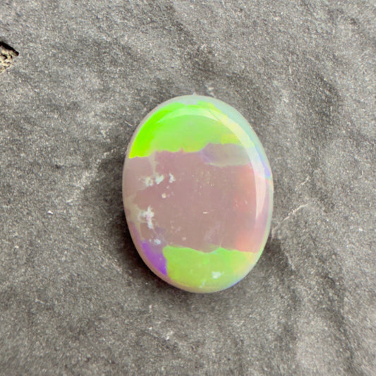 0.77cts Affordable Dark Opal With A Vivid Green Yellow Gold Play Of Color, From Lightning Ridge Australia