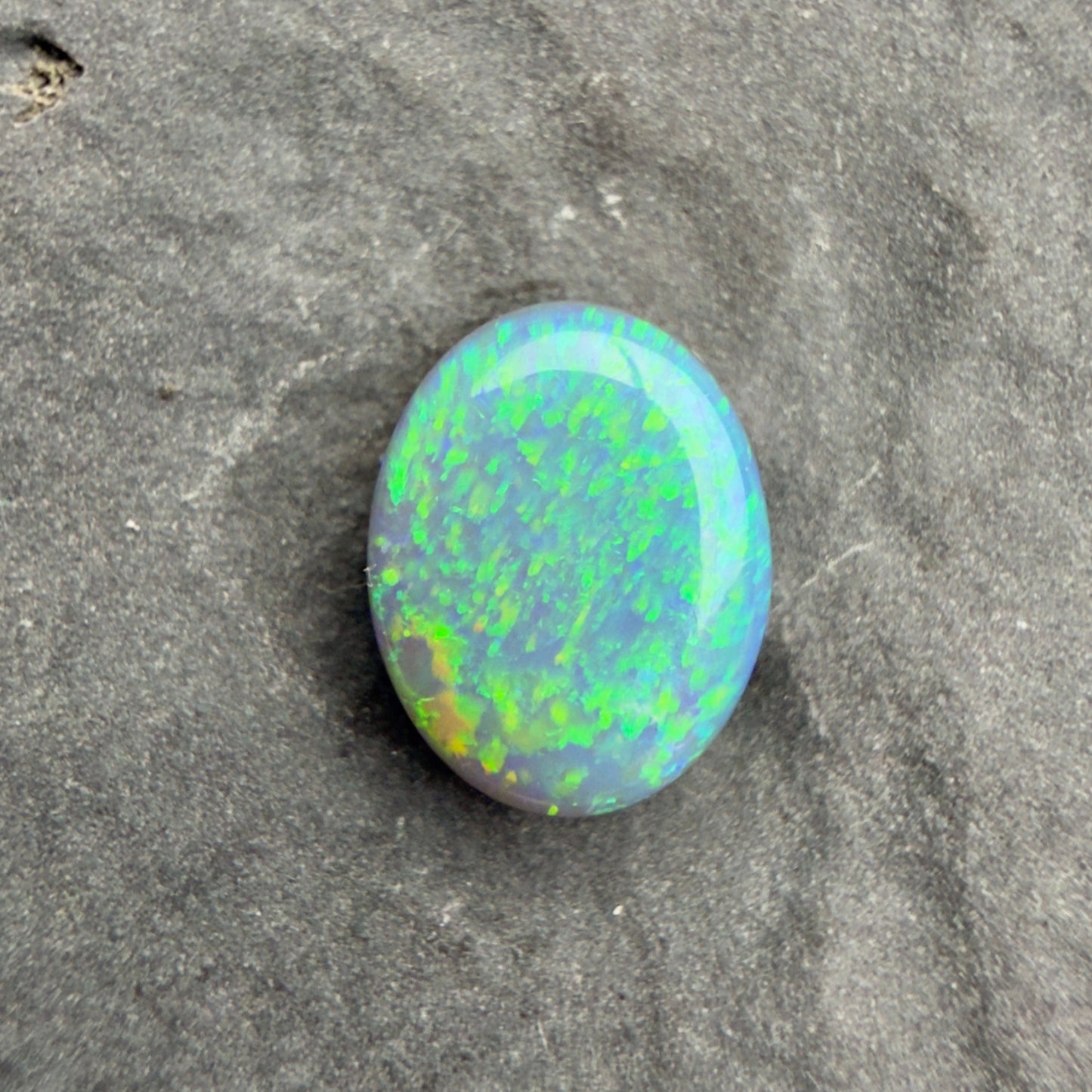 0.89cts Affordable Dark Opal With A Vivid Green Yellow Gold Play Of Color, From Lightning Ridge Australia