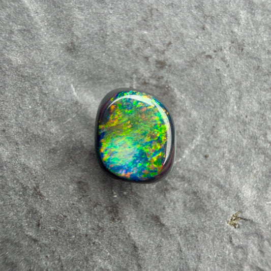 0.66cts Affordable Black Opal With A Vivid Red Pink Multicolor Play Of Color, From Lightning Ridge Australia