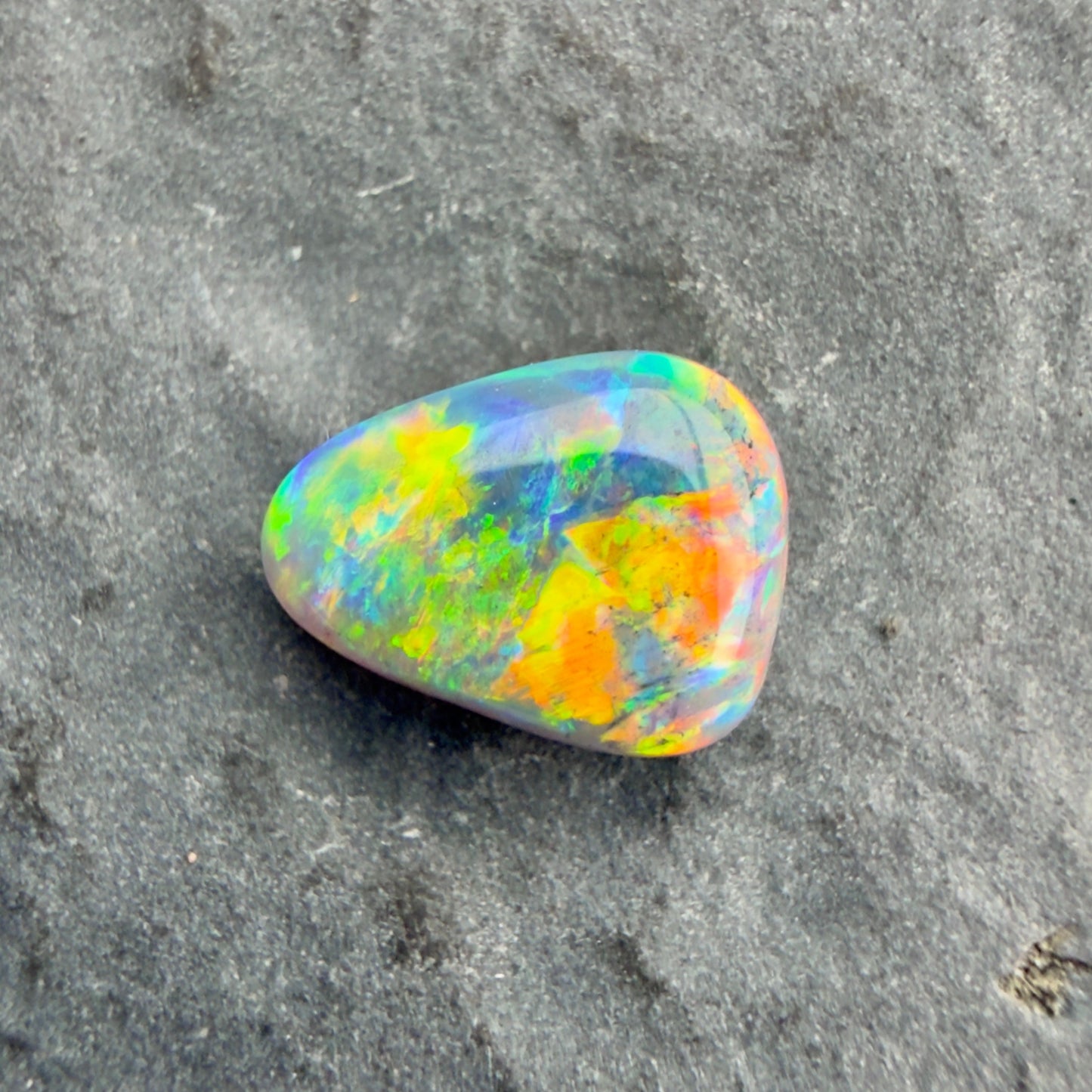 0.6cts Gem Black Opal With A Vivid Red Pink Multicolor Play Of Color, From Lightning Ridge Australia
