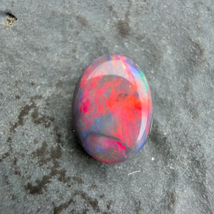 Black Opal With A Vivid Red Pink Multicolor Play Of Color, From Lightning Ridge Australia