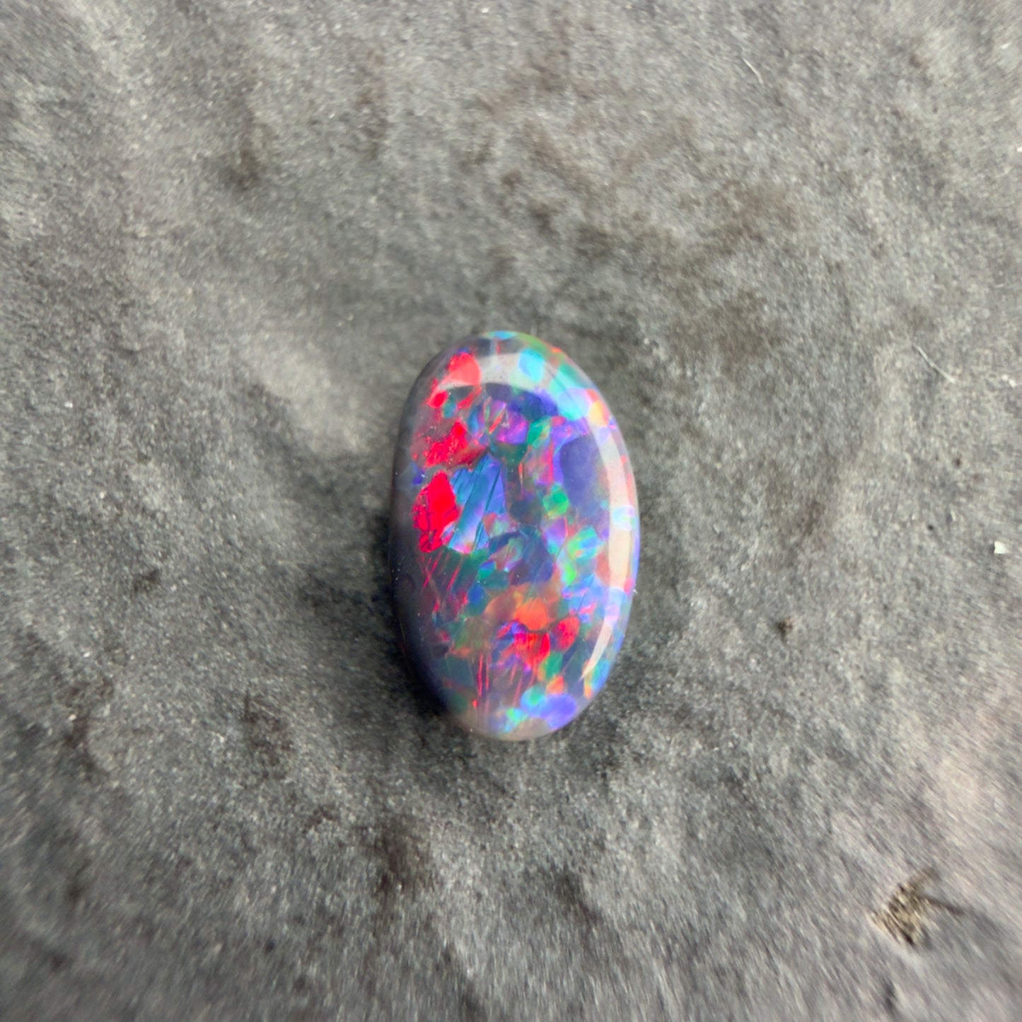 0.43cts Affordable Black Opal With A Vivid Red Pink Multicolor Play Of Color, From Lightning Ridge Australia
