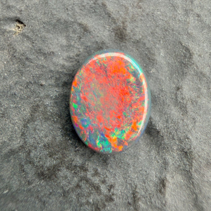 0.81ct Gem Black Opal With A Vivid Red Pink Multicolor Play Of Color, From Lightning Ridge Australia