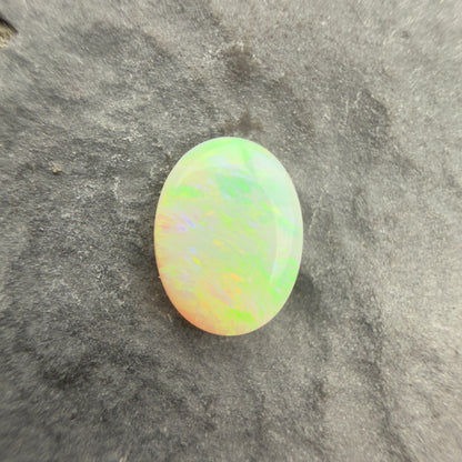 0.61cts Affordable Dark Opal With A Green Yellow Gold Play Of Color, From Lightning Ridge Australia