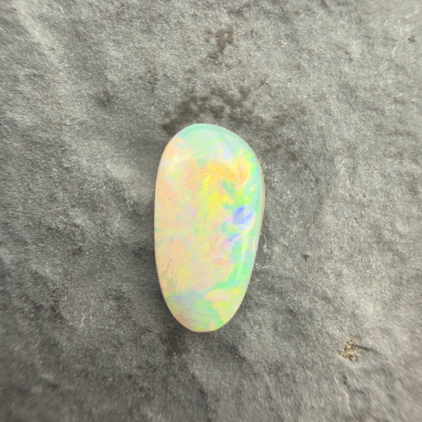 0.9cts Affordable Crystal Opal With A Green Yellow Gold Play Of Color, From Lightning Ridge Australia