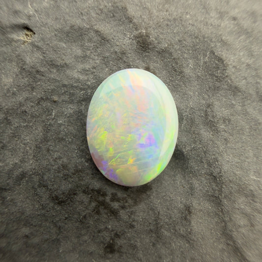 0.61cts Affordable Crystal Opal With A Green Yellow Gold Play Of Color, From Lightning Ridge Australia