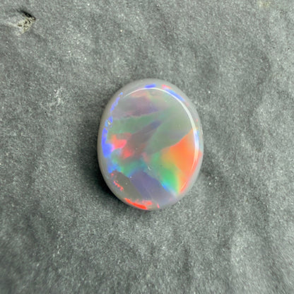 0.7cts Affordable Dark Opal With A Blue Red Multicolor Play Of Color, From Lightning Ridge Australia