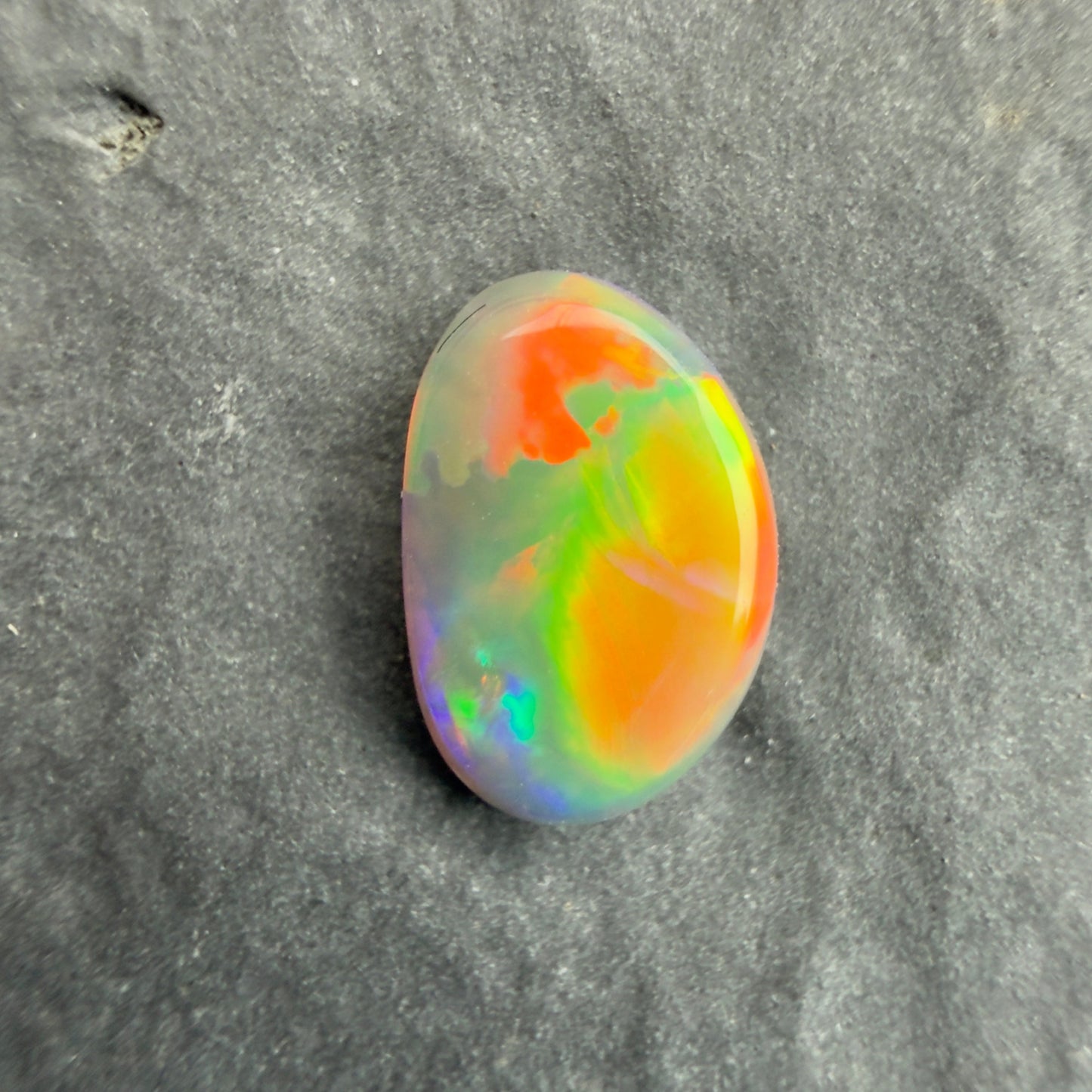 0.74cts Affordable Dark Opal With A Red Orange Multicolor Play Of Color, From Lightning Ridge Australia