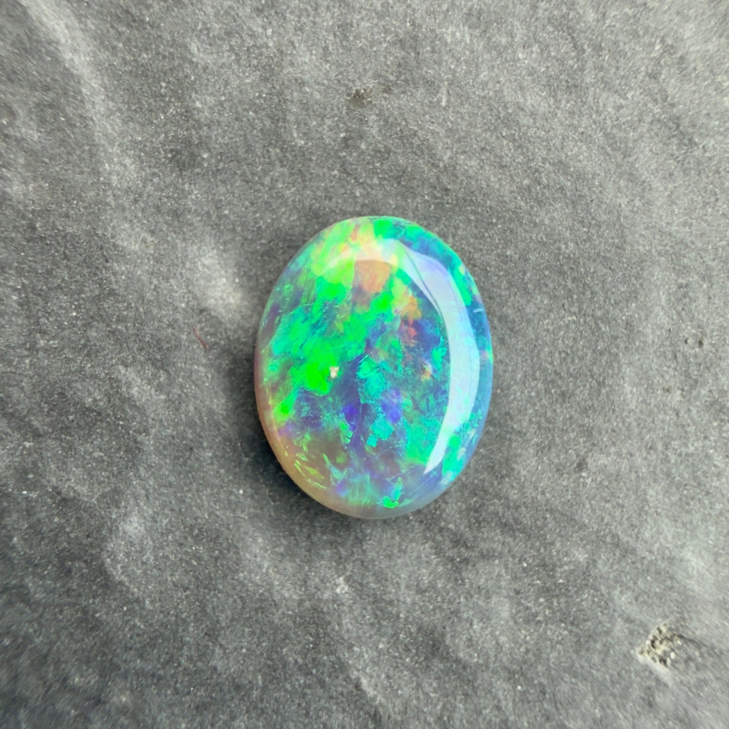 0.58cts Affordable Black Opal With A Green Blue Play Of Color, From Lightning Ridge Australia