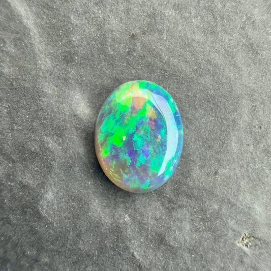 0.58cts Affordable Black Opal With A Green Blue Play Of Color, From Lightning Ridge Australia