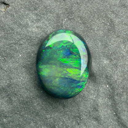 1.27cts Black Opal With A Deep Green Blue Play Of Color, From Lightning Ridge Australia