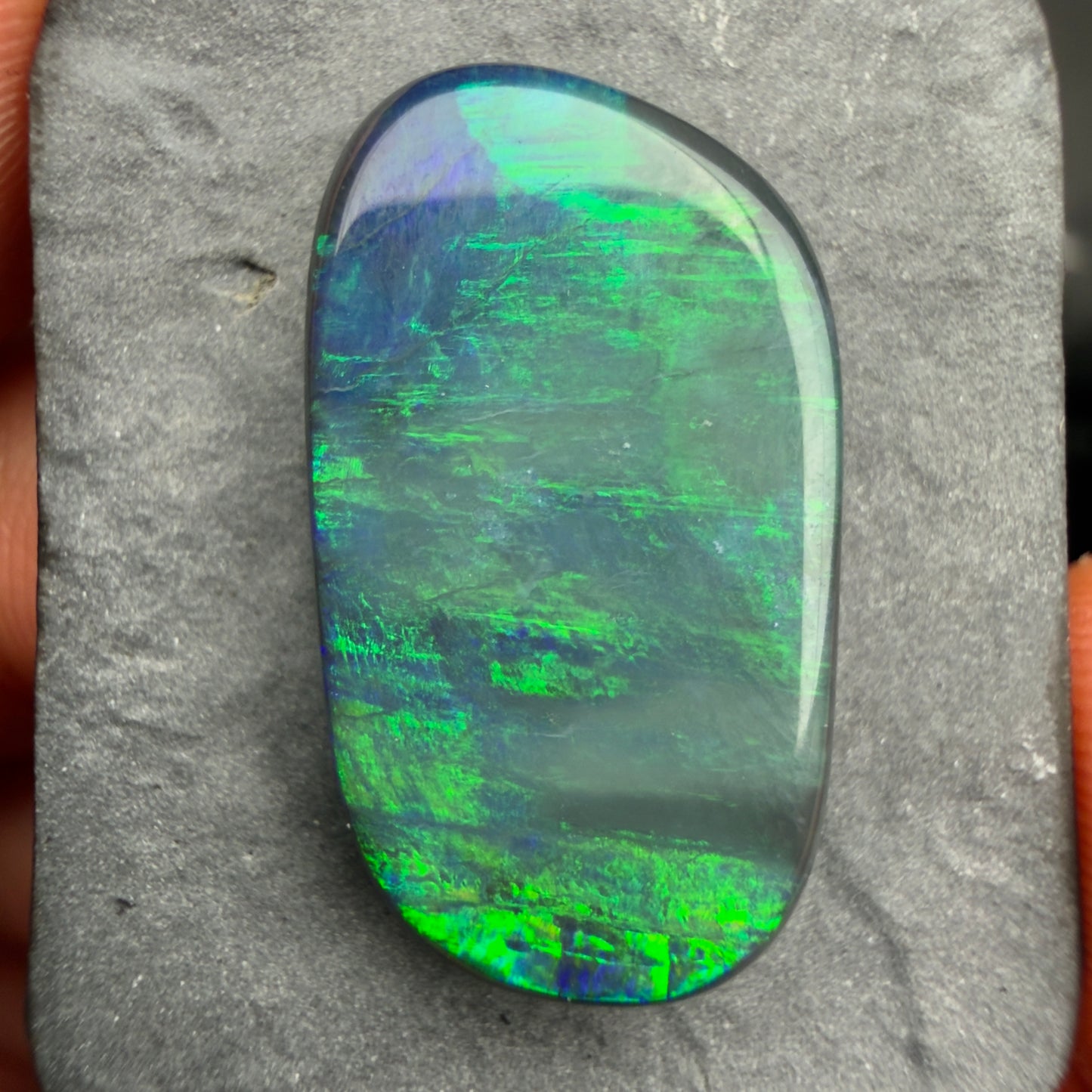 8.6cts Black Opal With A Deep Green Blue Play Of Color, From Lightning Ridge Australia