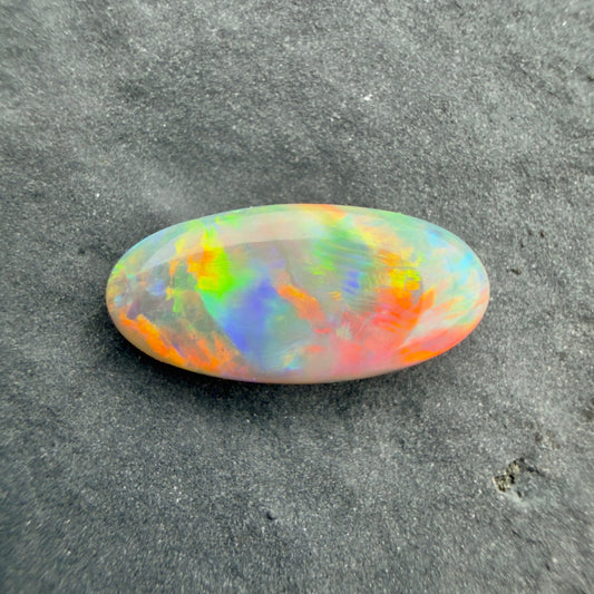 0.95cts Affordable Dark Opal With A Red Multicolor Play Of Color, From Lightning Ridge Australia