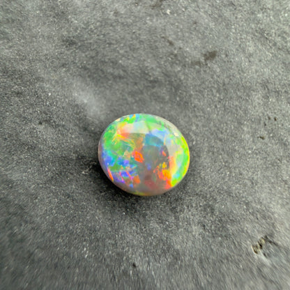 0.45cts Affordable Black Opal With A Red Multicolor Play Of Color, From Lightning Ridge Australia