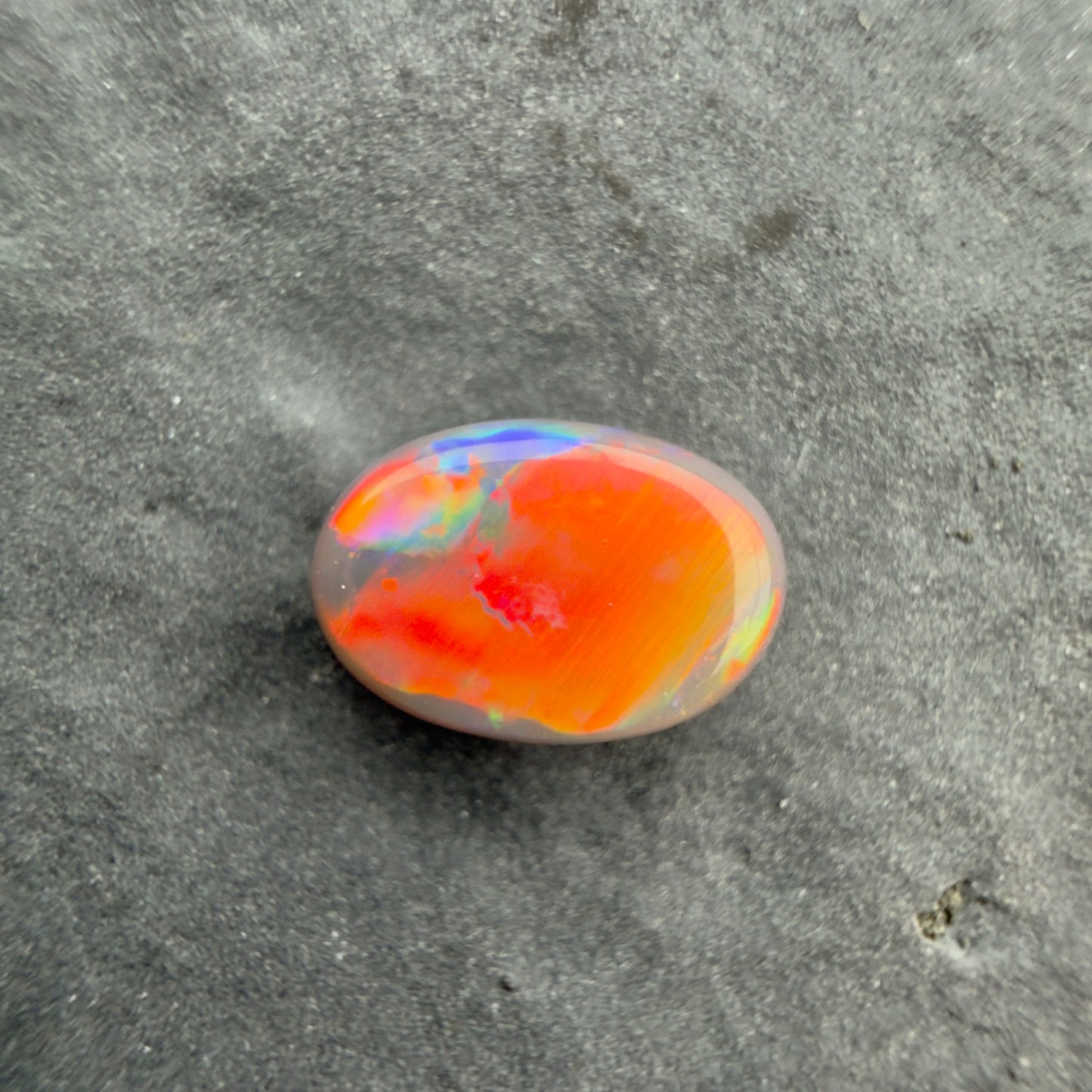 0.9cts Affordable Black Opal With A Red Multicolor Play Of Color, From Lightning Ridge Australia