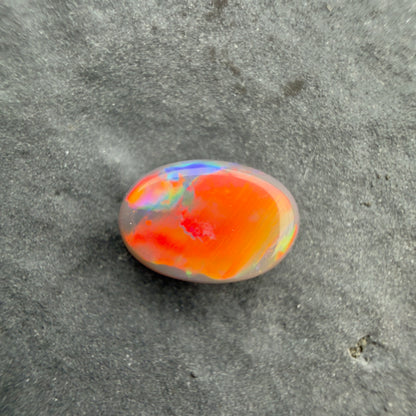 0.9cts Affordable Black Opal With A Red Multicolor Play Of Color, From Lightning Ridge Australia