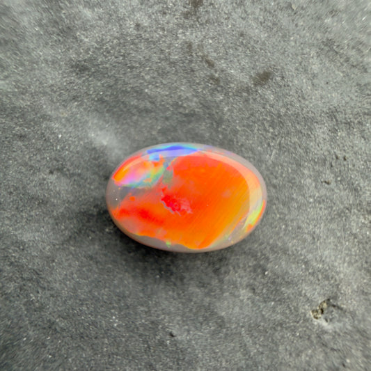 0.9cts Affordable Black Opal With A Red Multicolor Play Of Color, From Lightning Ridge Australia