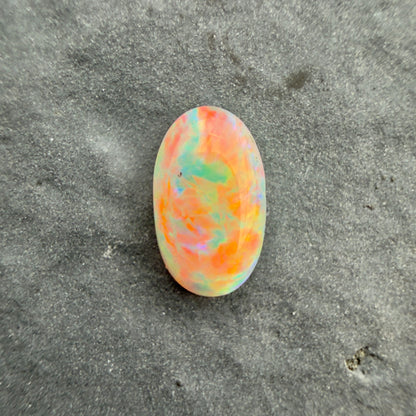 0.55cts Affordable Crystal Opal With A Red Multicolor Play Of Color, From Lightning Ridge Australia