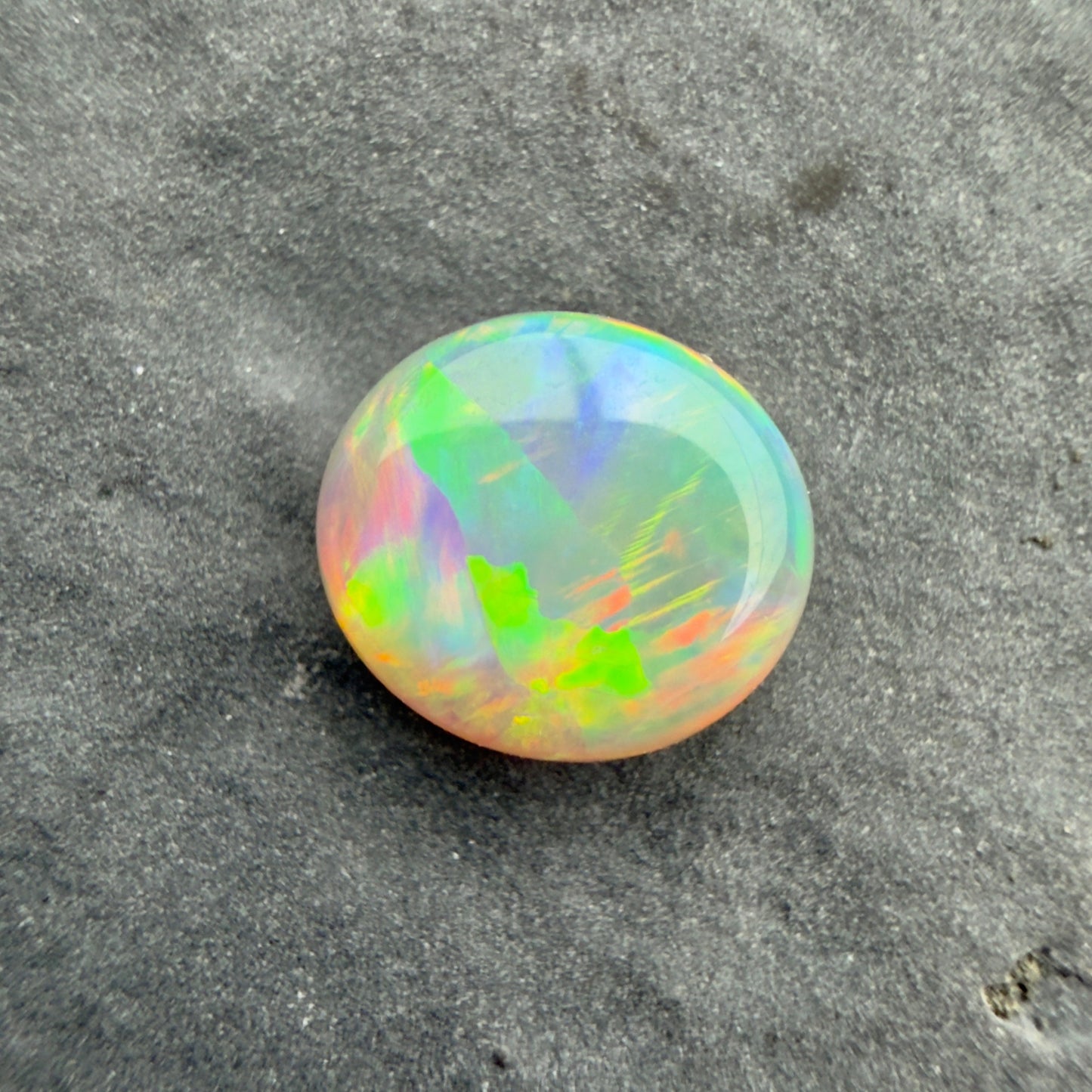 0.85cts Affordable Crystal Opal With A Green Yellow Gold Play Of Color, From Lightning Ridge Australia