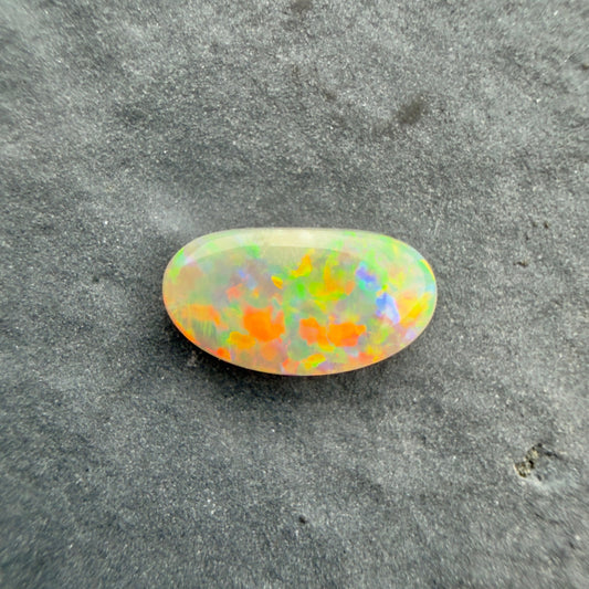 0.6cts Affordable Dark Opal With A Red Multicolor Play Of Color, From Lightning Ridge Australia