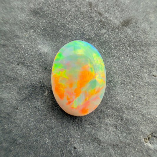 0.65cts Affordable Dark Opal With A Green, Yellow, Gold Play Of Color, From Lightning Ridge Australia