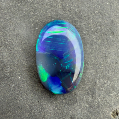 0.74cts Affordable Black Opal With A Blue Green Play Of Color, From Lightning Ridge Australia