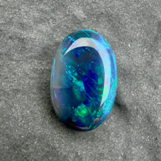 0.7cts Affordable Black Opal With A Blue Green Play Of Color, From Lightning Ridge Australia