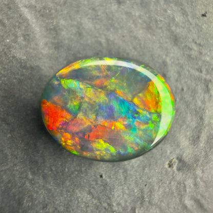 4.33cts Gem Black Opal With A Beautiful Red Multicolor Play Of Color, From Lightning Ridge Australia
