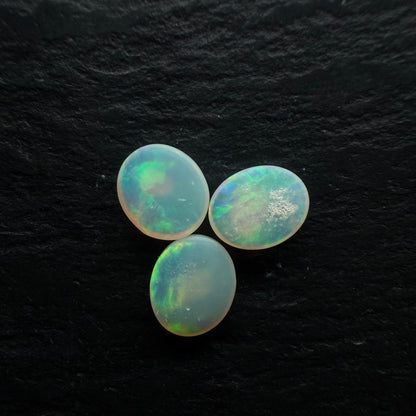 BUNDLE (price for parcel) Crystal Opals With A Vivid Green-Multicolor Palette.