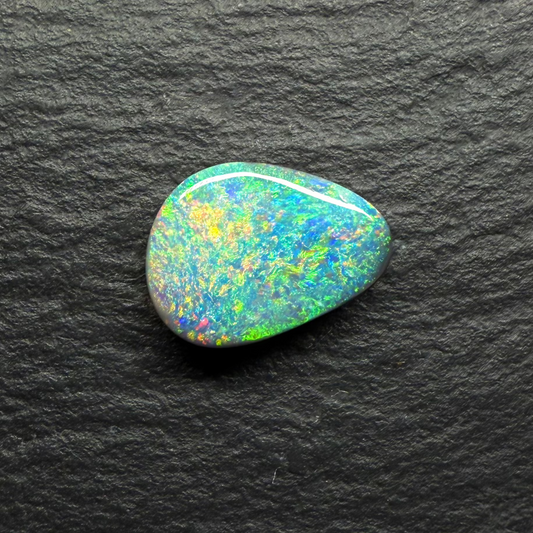 Lovely Freeform Black Opal With Small Flash Pattern And a Multi-Color Palette