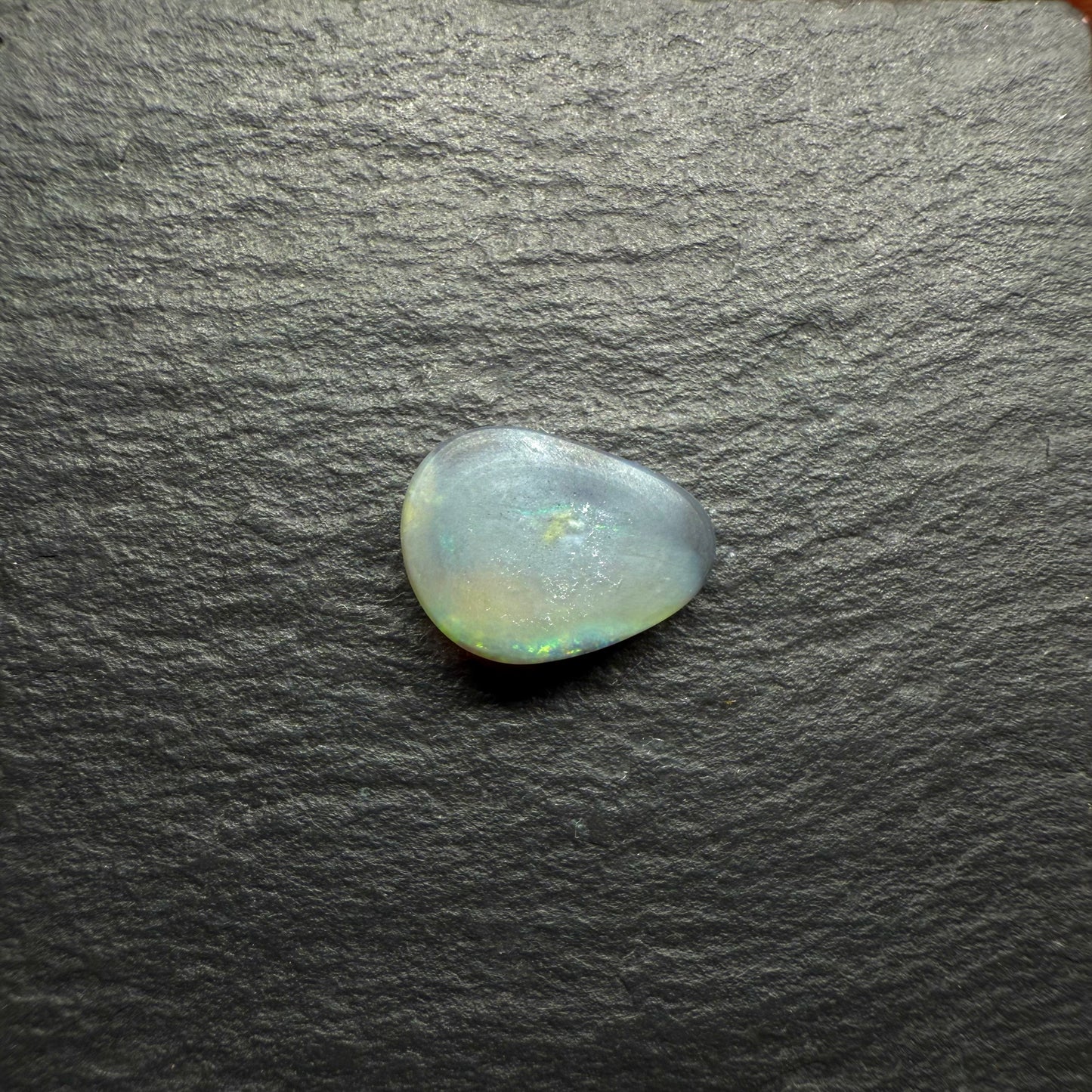 Lovely Freeform Black Opal With Small Flash Pattern And a Multi-Color Palette