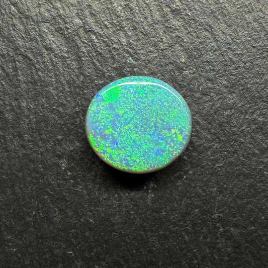 Black Opal With Great Color Dispersal And A Small Flash Pattern