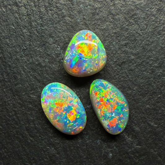 (Price per Stone) Dark opals With vivid Green -Gold Color Palettes and Pinfire Like Patterns