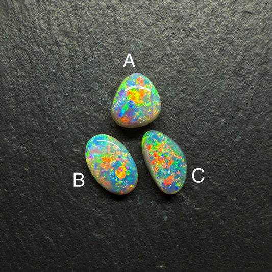(Price per Stone) Dark opals With vivid Green -Gold Color Palettes and Pinfire Like Patterns