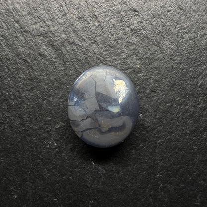 2.5ct Top Gem Black Opal With Avivid Dark Green Color Palette, Hints Of Blue And A Broad-flash Pattern