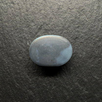 1.95ct World Class Black Opal. This Stone Has Blinding Green-Gold color Palette, With A Rolling Broadflash Pattern