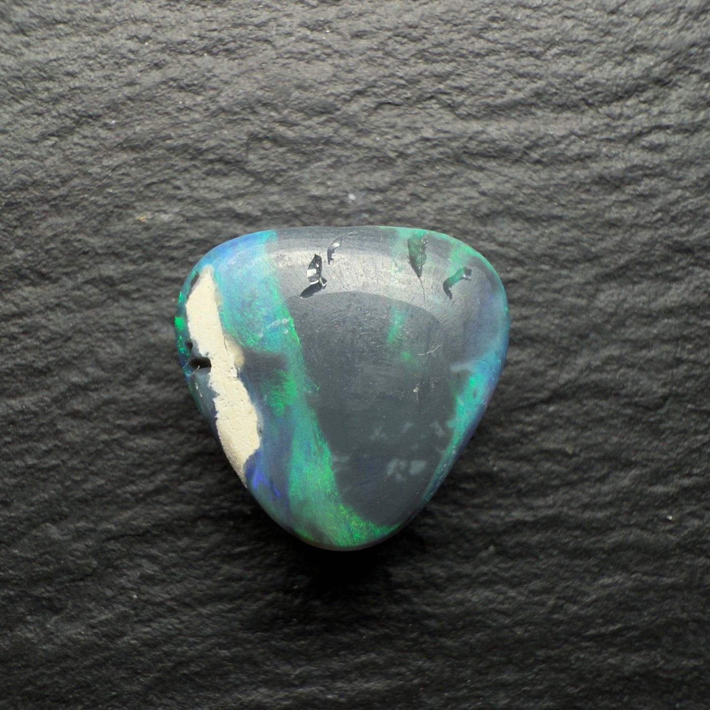 3.7ct Black Opal with A Lovely Teal Color Palette And A Moss Pattern