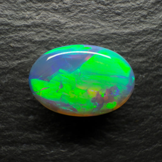 2.85ct Top Gem Black Crystal Opal With A Brilliant Green-Blue Color Palette and Broadflash Pattern